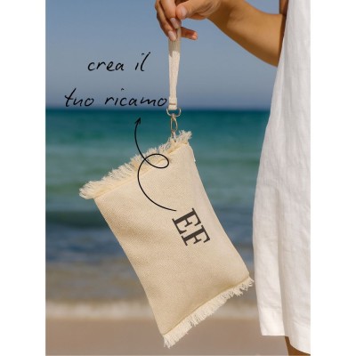 POUCH BAG IN CANVAS WITH FRINGES