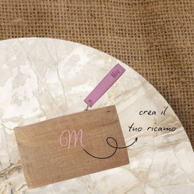 POCHETTE IN LAMINATED JUTE